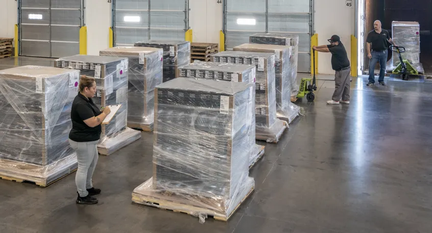 Cross-dock operation moving freight trailer to trailer