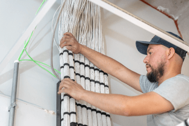 man-installing-wire