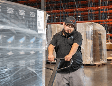 man moving cart